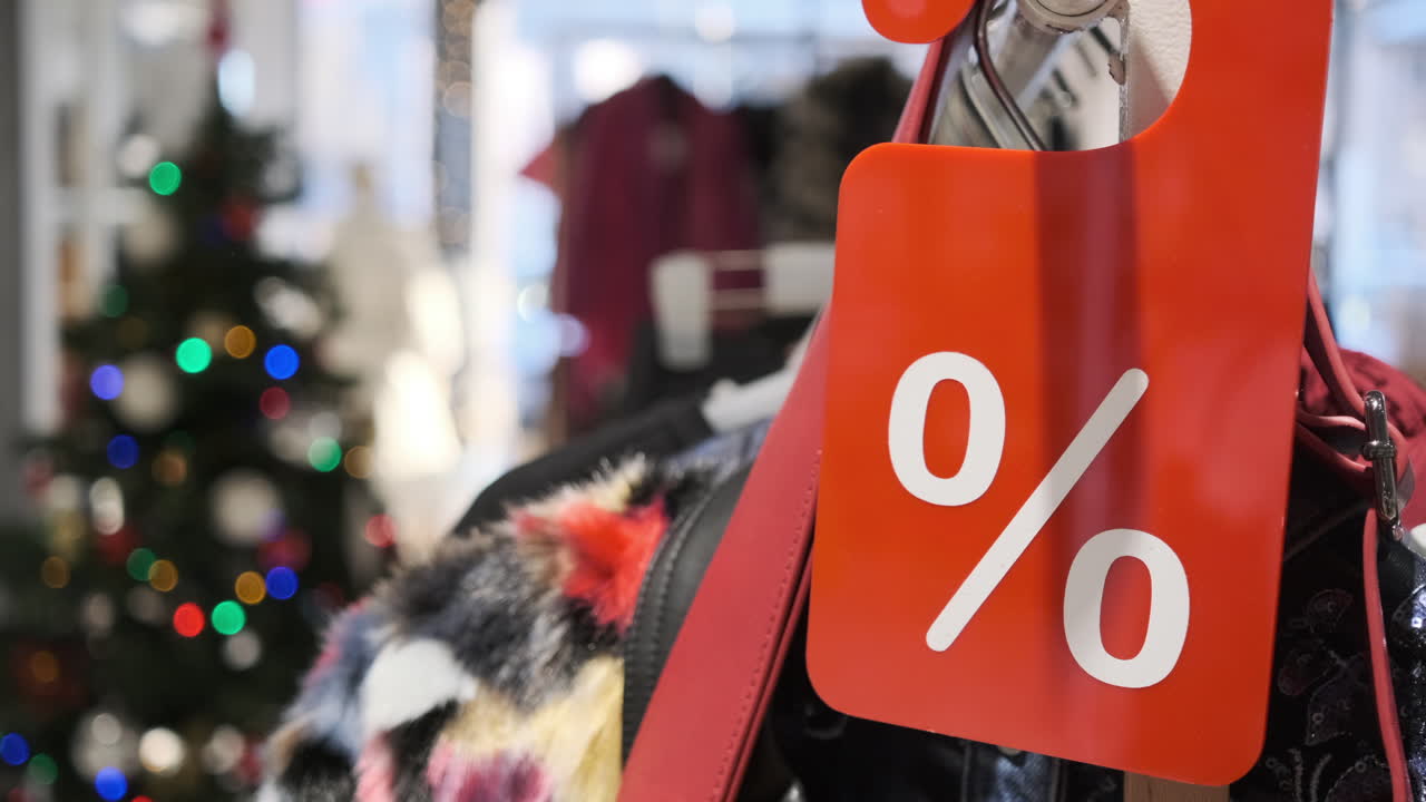 Seasonal and holiday discounts in clothing stores with a marked percentage of the price