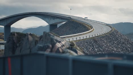 storseisundet bridge on the atlantic road rises above the turbulent waters