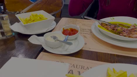eating chips with ketchup french fries restaurant pub table food dish