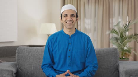 Happy-Muslim-man-smiling-to-the-camera