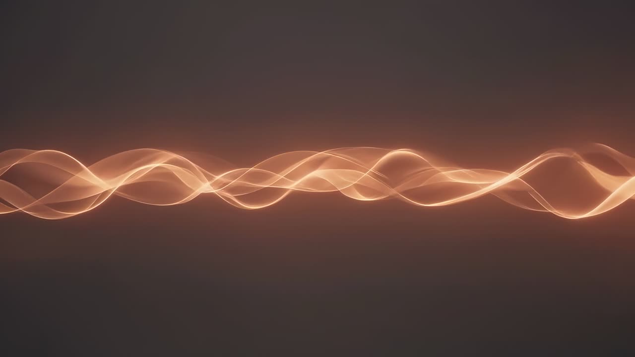 Pressing play, orange-gold strands pulsing and shifting across dark backdrop, showing energy flow