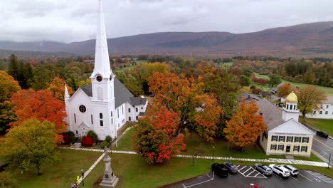 aerial push in manchester vermont in fall with autumn leaf color