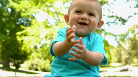 Cute-baby-sitting-on-the-grass