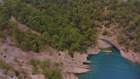 coastal landscape with turquoise bay and rocky cliffs