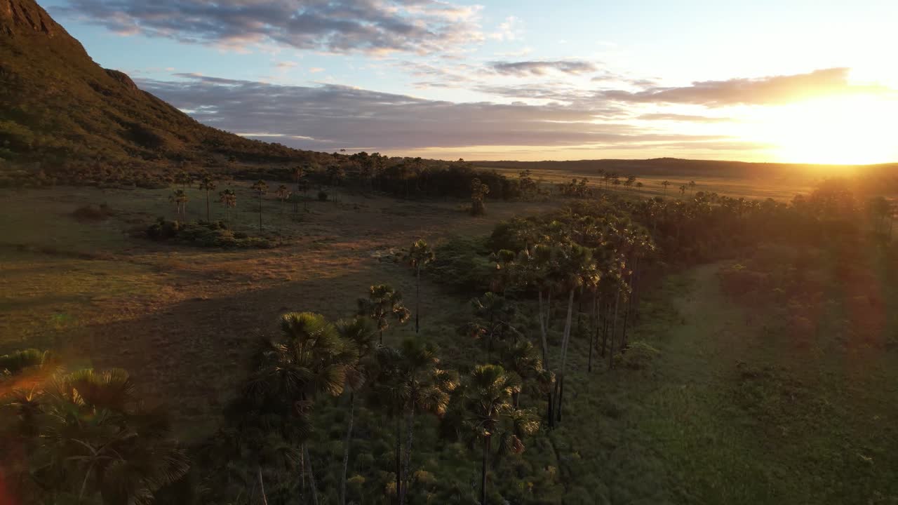 drone view Maytrea Garden and Morro da Baleia, panoramic aerial Jardim de Maytrea, green fields, mountains, sunset, Chapada dos Veadeiros, Goiás, Alto Paraíso