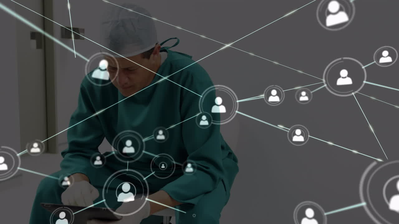 animación de la red de conexiones a través de un cirujano caucásico usando una tableta