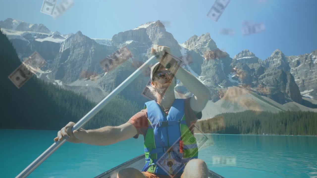 animación de billetes de dólar estadounidense cayendo sobre el hombre caucásico en canoa en el lago