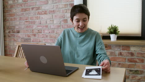 Woman-doing-videocall-on-the-table