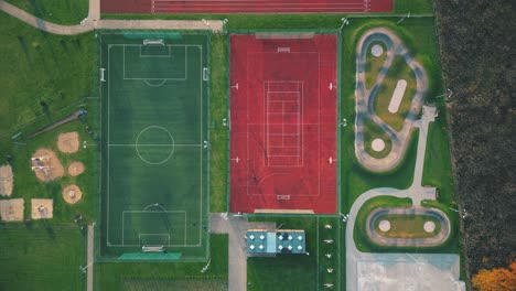 Recreational-green-grass-active-sports-hockey-and-football-fields-overhead-top-down-view