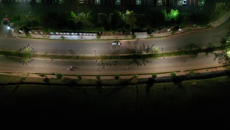 night aerial view of city road with traffic