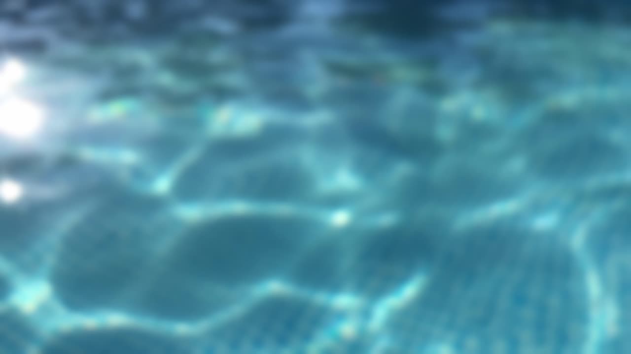 Premium stock video - Ripples on the surface of the transparent blue ...