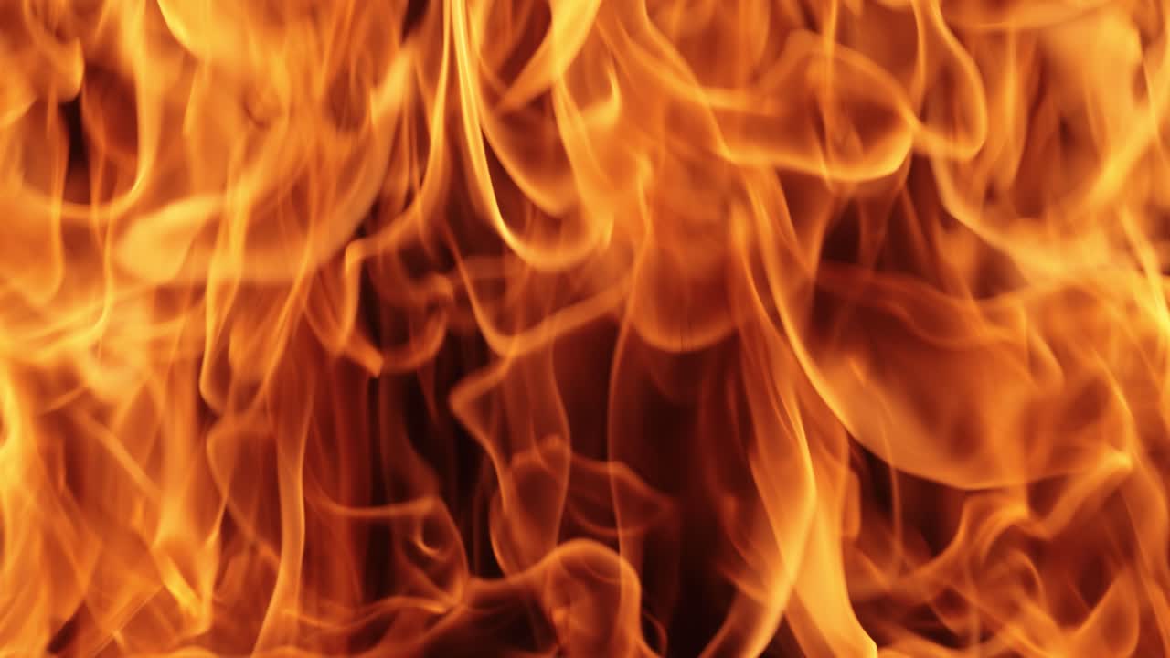 Flames of fire on black background in slow motion