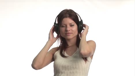 Woman-listening-to-music-and-Dancing