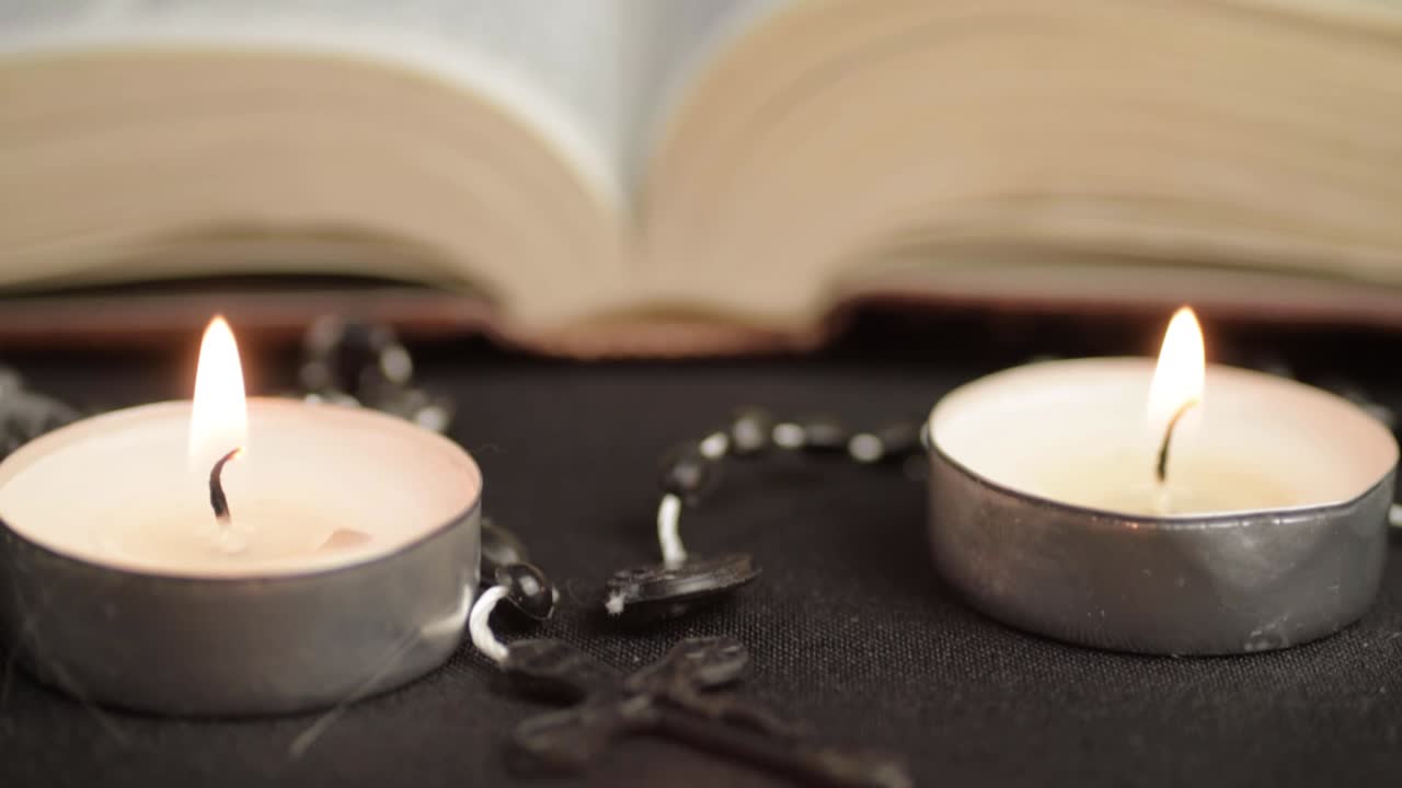 Candles, Rosary and Book