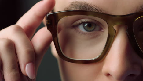 Extreme-closeup-of-half-face-shoot-of-attractive-female-face-in-glasses.