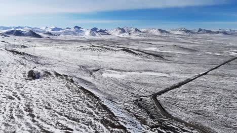 aerial establishing reveals altitude road, secluded path in snowed himalayan mountains, road to mount everest