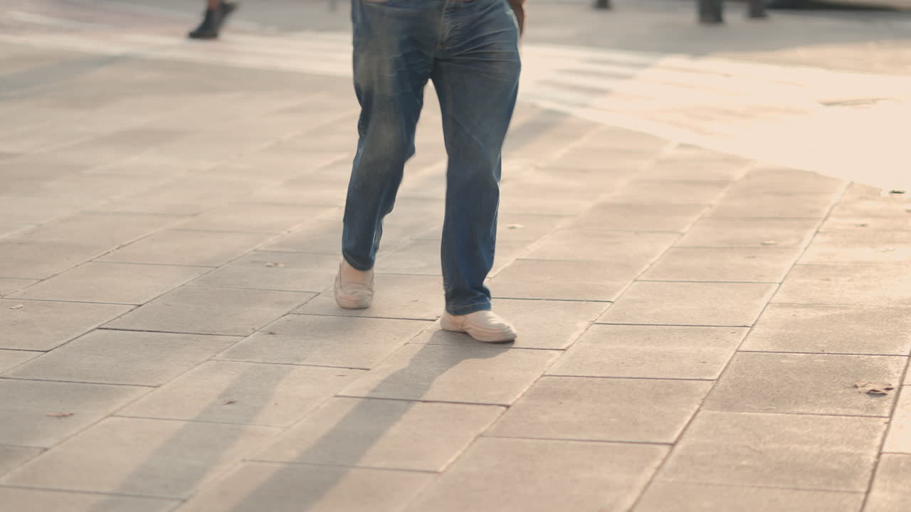 Man walking on a city sidewalk