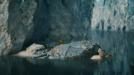 rocky cliffs in the ocean at sunny day