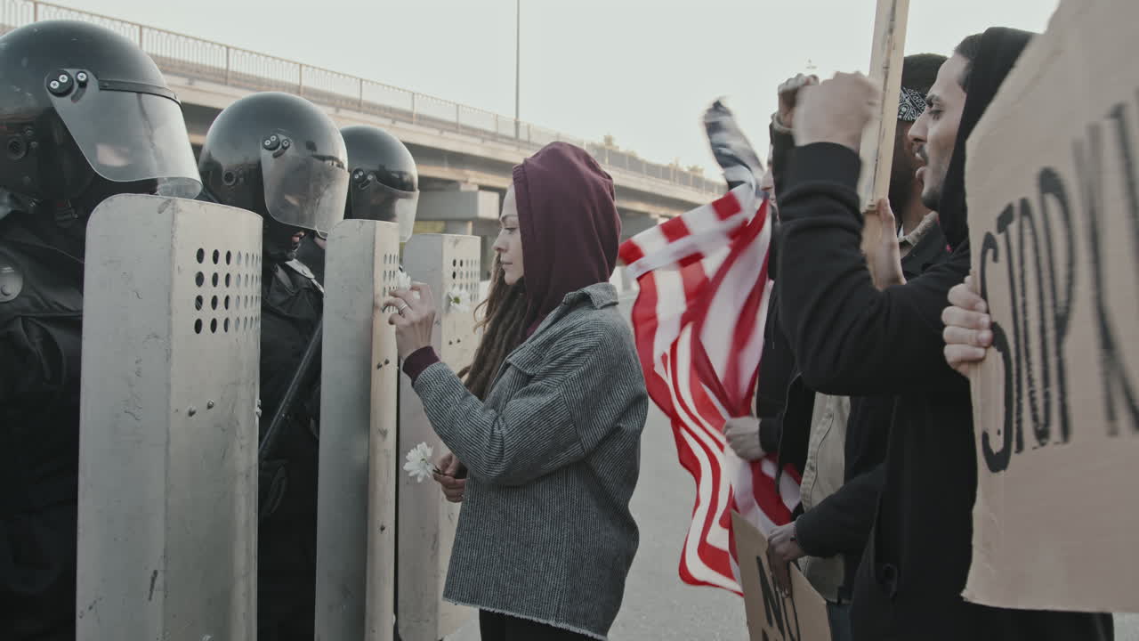 Protesters Face Riot Police