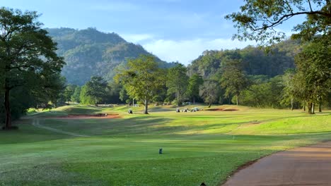 lush golf course with mountain backdrop