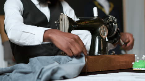 man working in a tailor shop