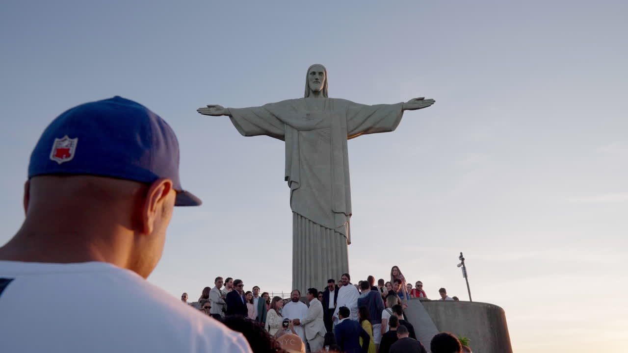 Tourists in the area of   Christ The Redeemer in Rio De Janeiro, Brazil. Landmark Tourism Outdoor in Corcovado Mountain.