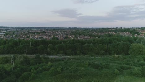 Aerial-shot-flying-across-newt-ponds-at-Mouldon-Hill-Country-Park-in-England