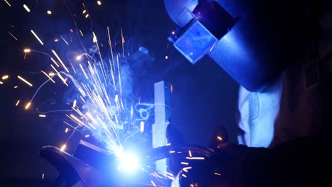 welder welding a metal