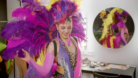 showgirls dancing in front of a mirror