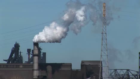 Smoke-Billows-Out-Of-An-Industrial-Building'S-Smokestack