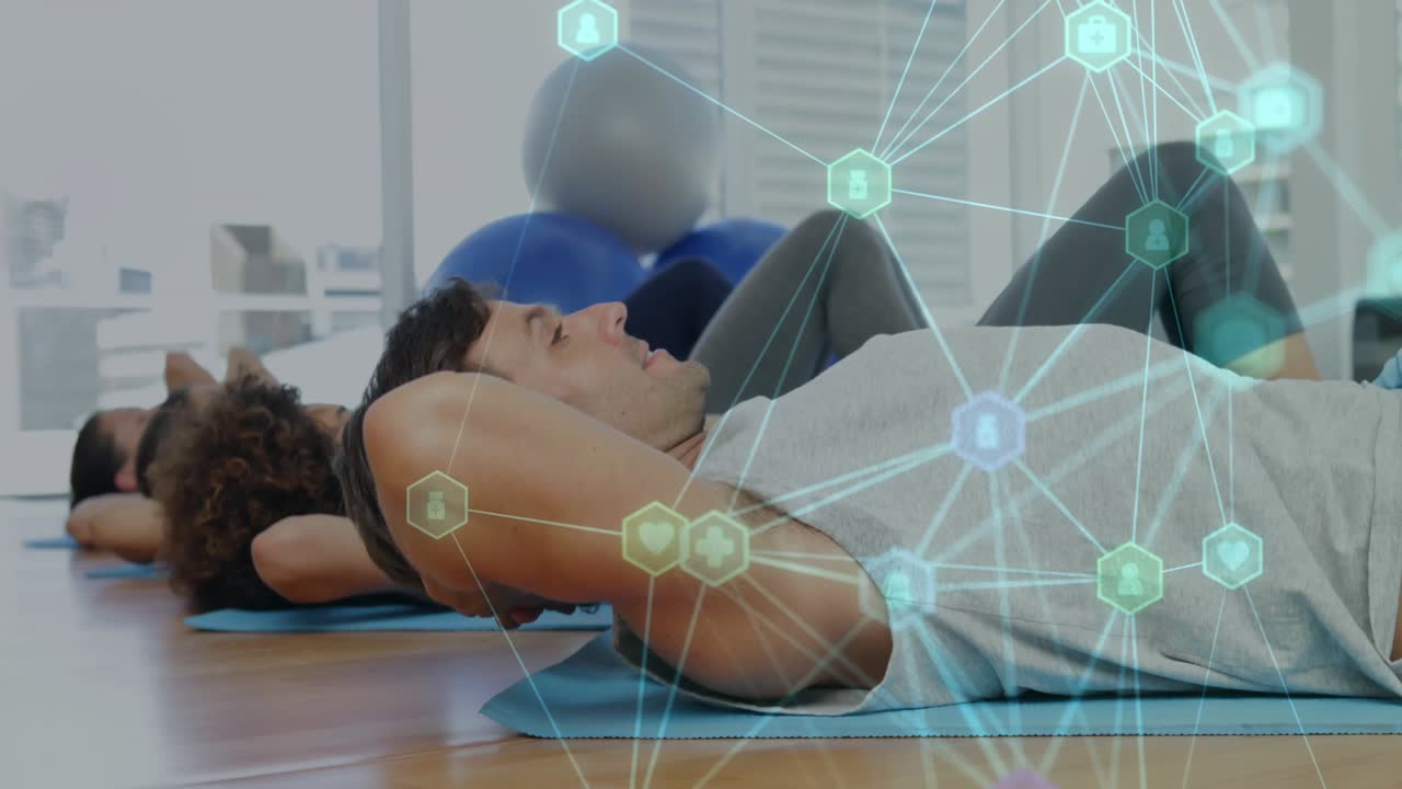 When exercise begins fitness group performing crunches to strengthen core with digital overlay