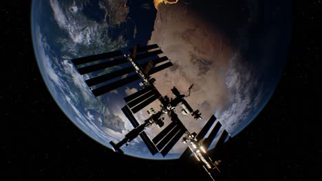 international space station in outer space over the planet earth orbit