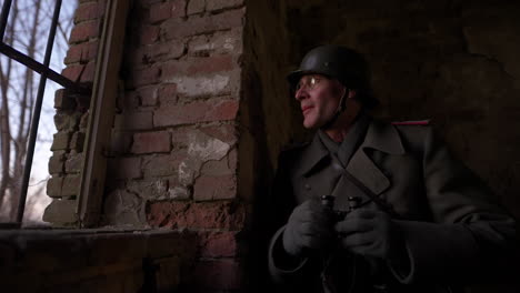 wwii soldier observing from ruins