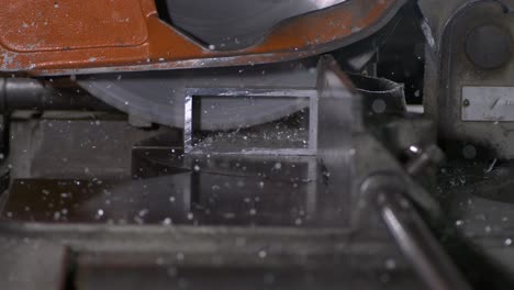 circular saw cutting a aluminium shaped pipe in super slow motion 800 fps