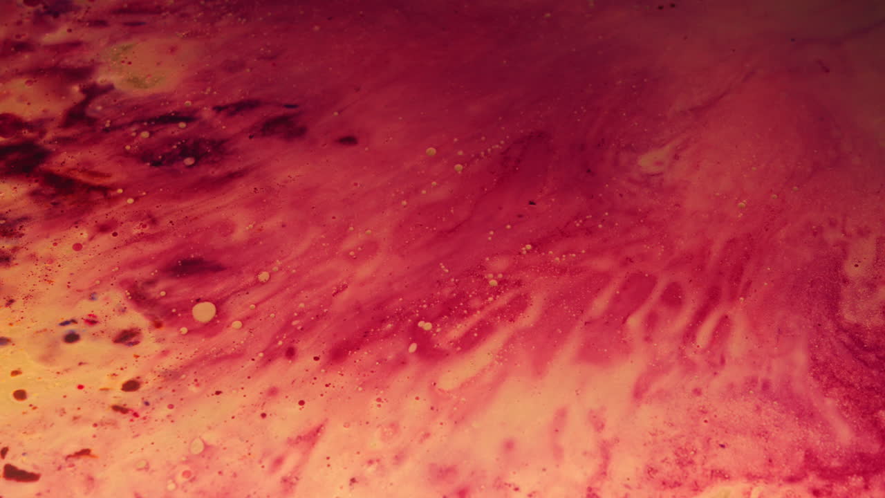 Colourful, organic, liquids macro shots buzzing and flowing