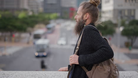 portrait homeless bearded hippie man relaxing enjoying carefree urban lifestyle caucasian male beggar travel in city wearing backpack slow motion