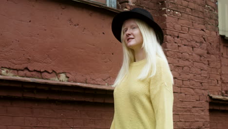 woman with black hat outdoors