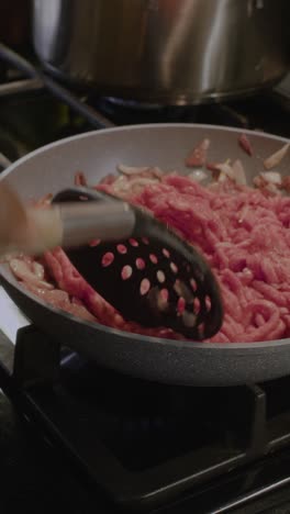 person cooking in the kitchen