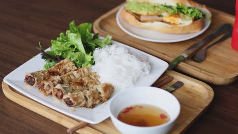 showcasing a traditional vietnamese dish on a table.