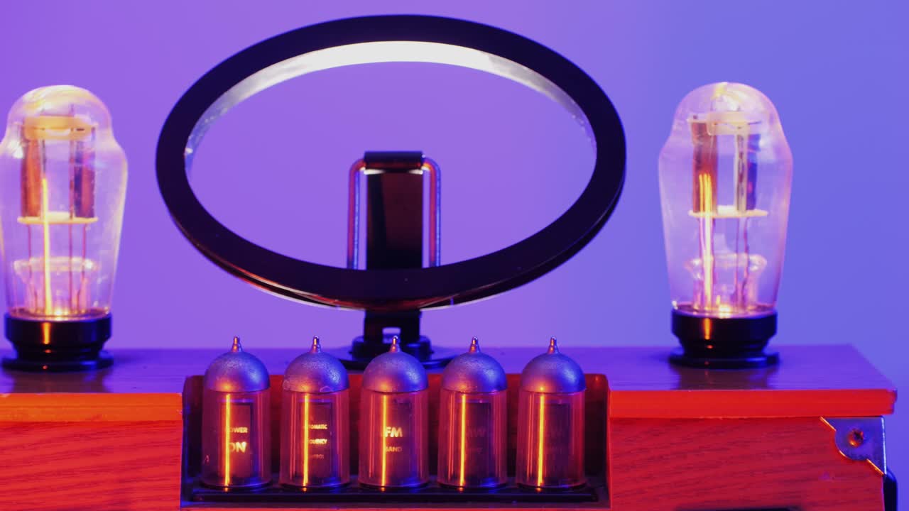 Old Retro AM FM Radio with tubes, Hand Changing stations , bulb vintage music player.