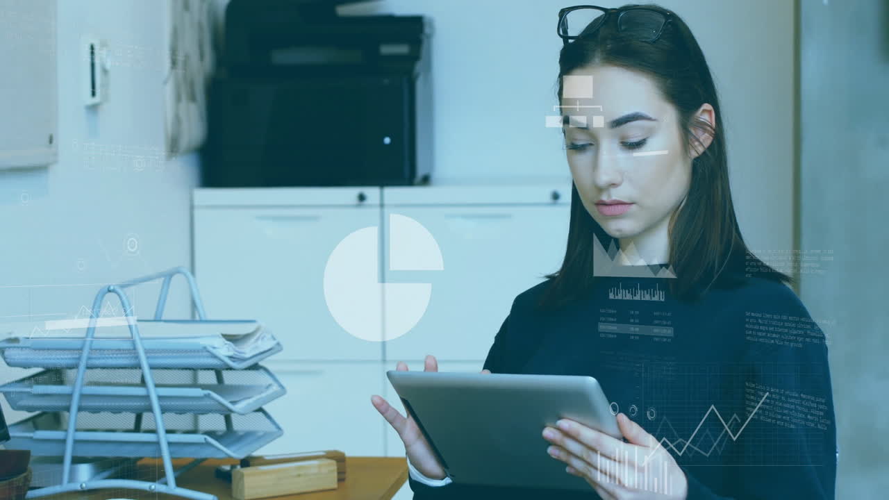 Using tablet with animation graphics overlay, woman working in office