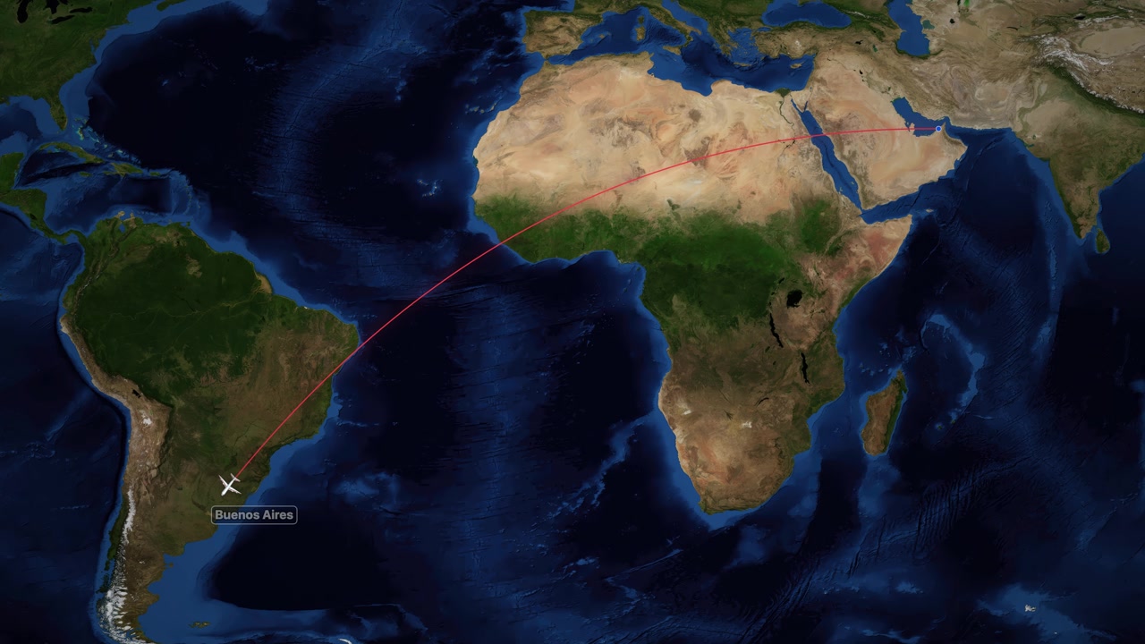 Satellite world map animation tracks a commercial airplane flying from Dubai to Buenos Aires