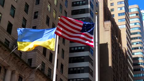 usa and ukraine flags waving together in new york city