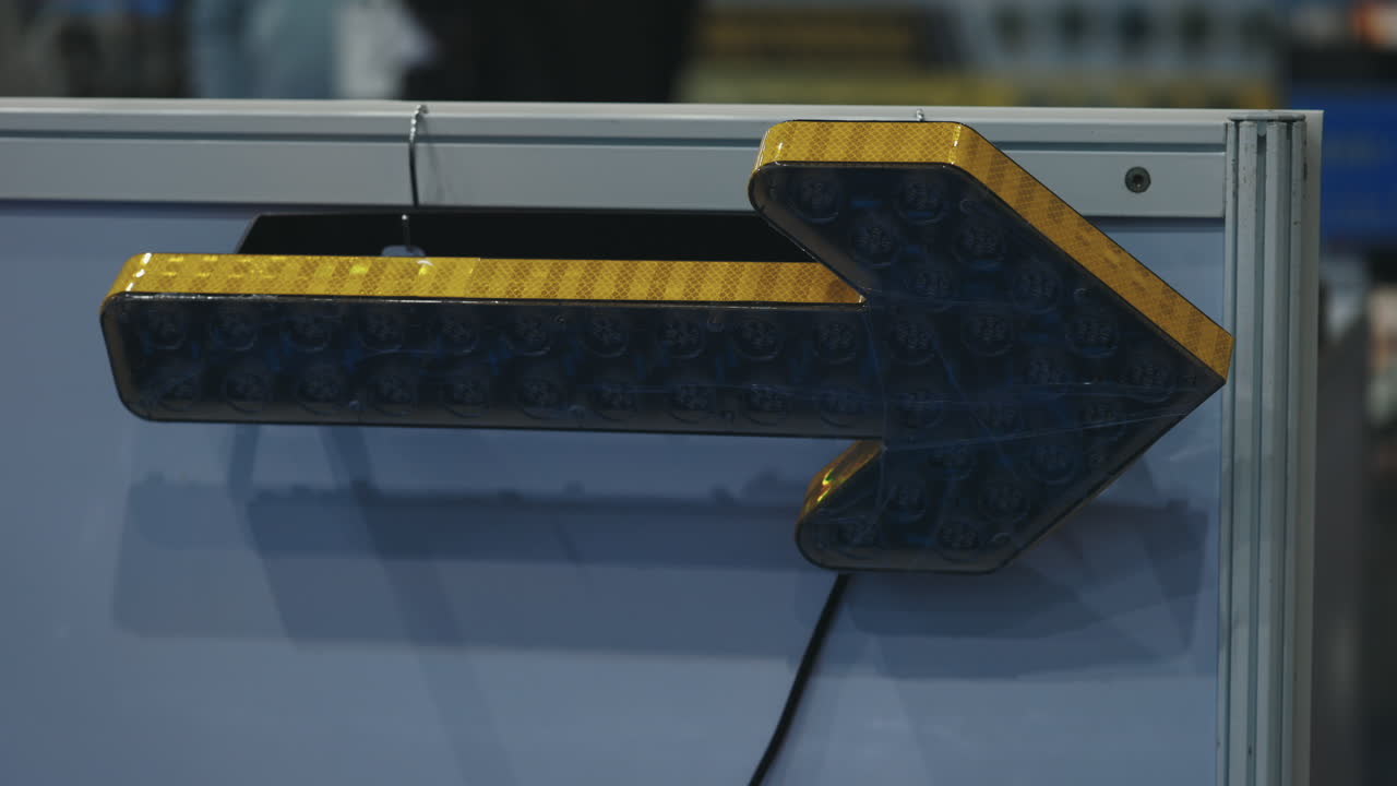 Illuminated Yellow Arrow Sign