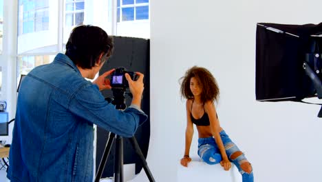 female model posing for a photoshoot in the studio 4k
