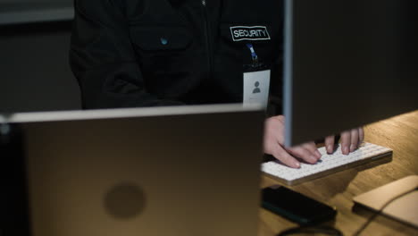 man with keyboard in the hut at night