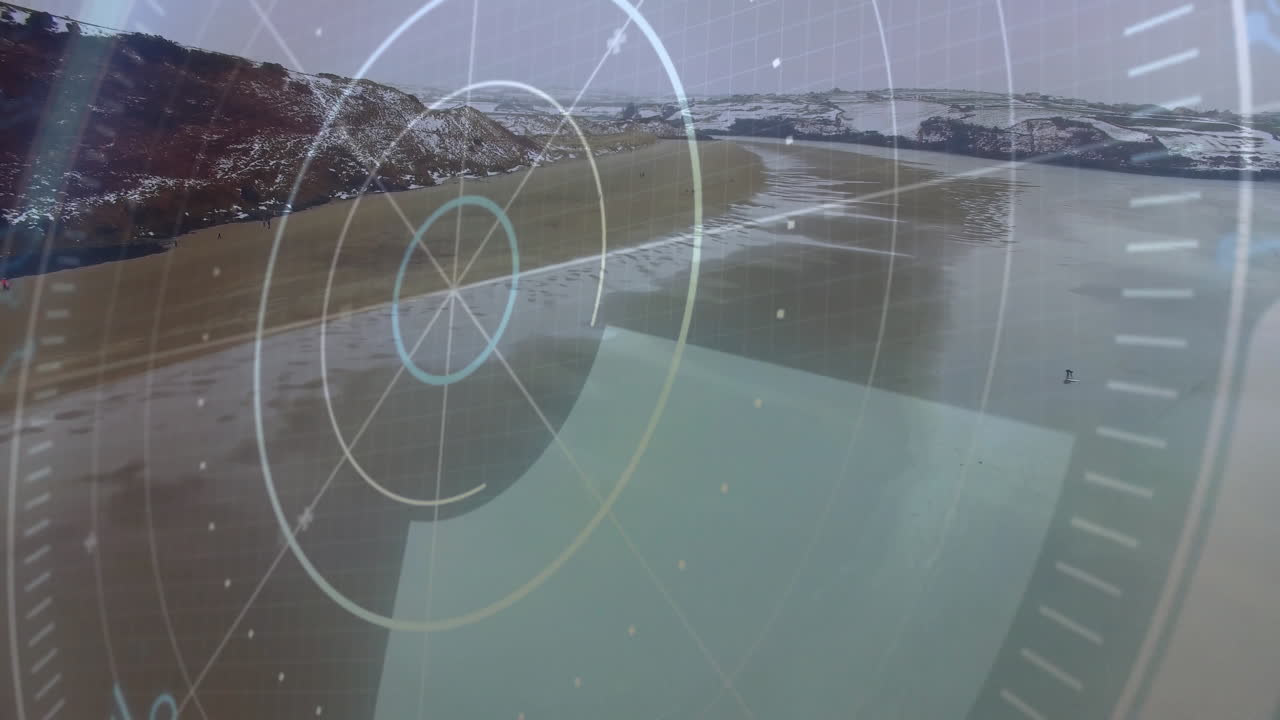 Paddleboarding rider riding board over aerial sandy beach bay, showing HUD overlay with gridlines