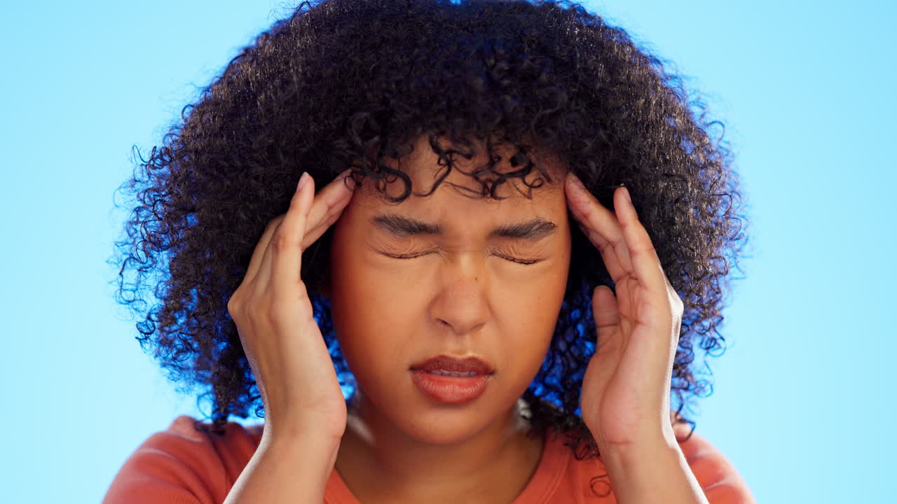 Black woman has headache, pain with stress