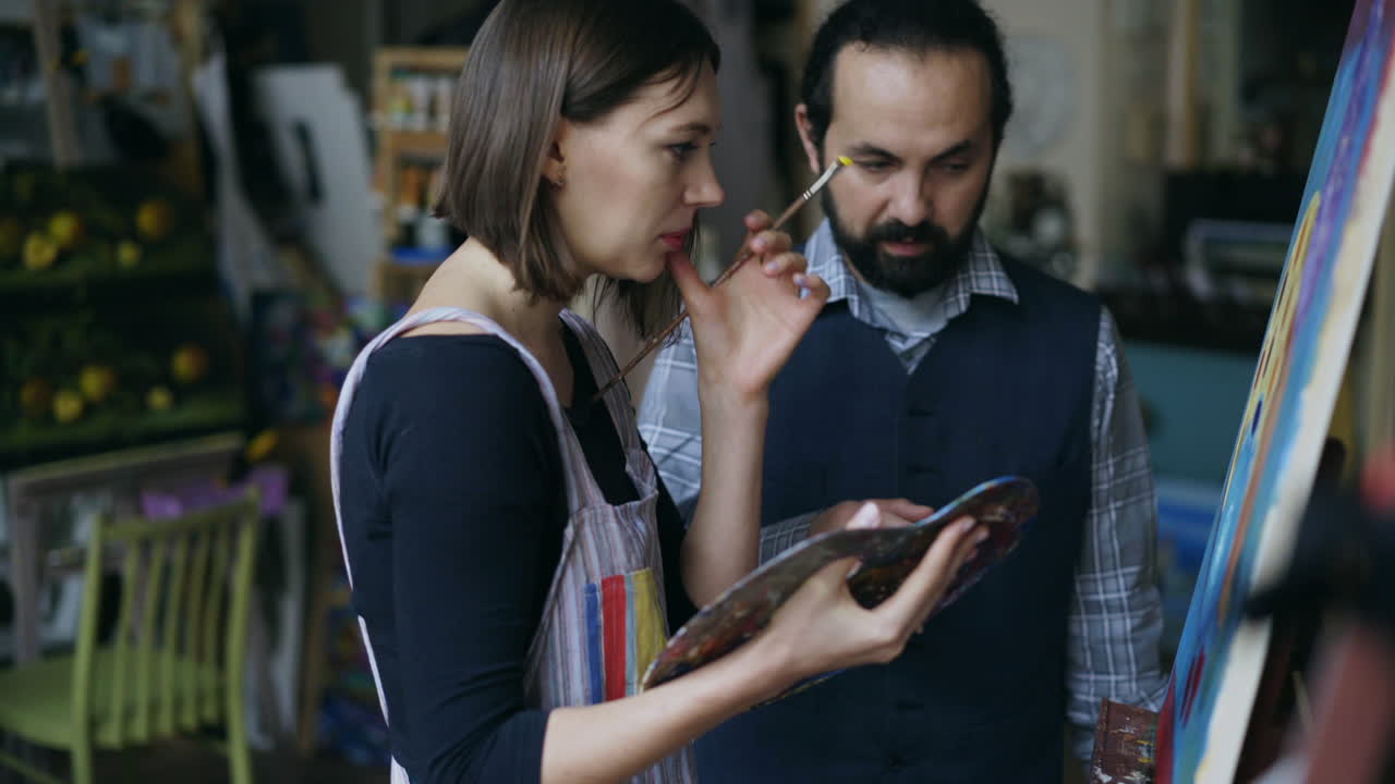 Couple Painting in an Art Studio