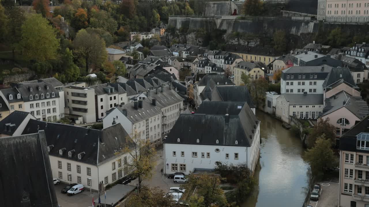 Aerial view of Luxembourg's old rooftops, serene autumn mood, historic town